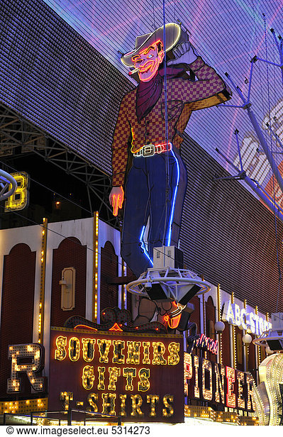 Vegas Vic  famous cowboy figure on a neon sign in old Las Vegas  Pioneer Casino Hotel  Fremont Street Experience  downtown Las Vegas  Nevada  United States of America  USA  PublicGround
