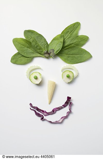 Vegetable face with spinach hair