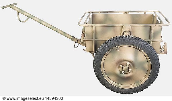 https://www0.imageselect.eu/image-stock-vehicules-militaires---remorque----munitions---en-parfait---tat-avec-un-timon-droit-et-coud----enti--rement-restaur--e---la-t--le-a---t---refaite-comme----l-origine--couleur-sable-avec-camouflage-vert-et-brun--pneus-neufs--rare-dans-cet---tat-----an-ammunition-trailer---in-very-good-condition---with-a-straight-and-angled-shaft--fully-restored---the-sheet-metal-has-been-redone-to-its-original-condition--tan-painted-with-green-and-brown-camo--brand-new-tyres--rare-in-this-condition--historic---historical-object---objects---stills---clipping---clippings---cut-out---cut-out---cut-outs---utensil---piece-of-equipment---utensils---accessory---accessories-------s-------s-----th-century-014594000-14594300.jpg