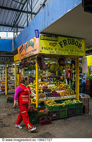 Venders at the Plaza de Mercado deÃ?Â Paloquemao in Bogota  Colombia sell everything from fruits and vegetables to fish to chickens.