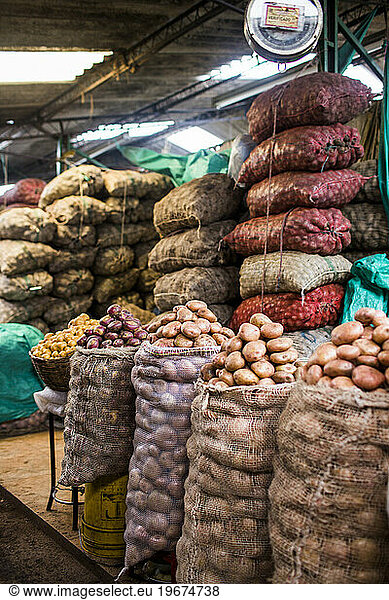 Venders at the Plaza de Mercado deÃ?Â Paloquemao in Bogota  Colombia sell everything from fruits and vegetables to fish to chickens.