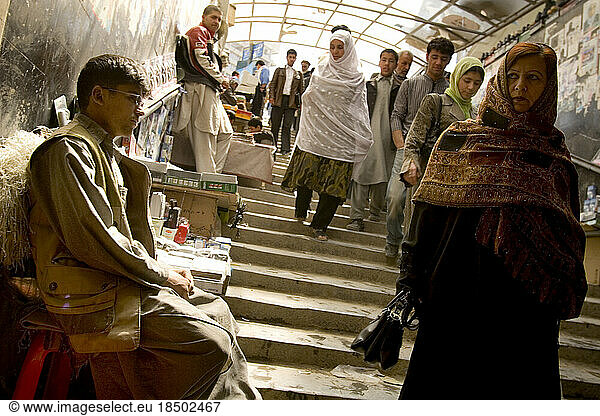 Vendors line a pedestrian underpass in Kabul.