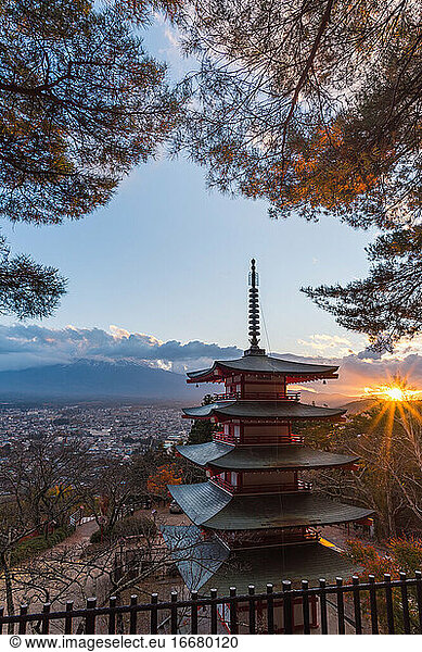 Vertical view of Chureito Pagoda with Fuji mountain hide in cloud