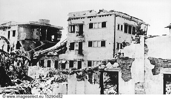 Vietnam War 1955 - 1975  aerial warfare  operation Rolling Thunder  2.3.1965 - 2.11.1968  destroyed textile factory in Nam Dinh  North Vietnam  exterior view  1966 / 1967  destruction  destructions  destroyed  building  buildings  ruin  ruins  war damage  air attack  bomb attack  air raid  bombardment  bomb attacks  air raids  bombardments  American Air Force  economy  industry  industries  Viet Nam  Vietnam  war  wars  20th century  1960s  operation  operations  textile factory  textile plant  textile factories  textile plants  historic  historical