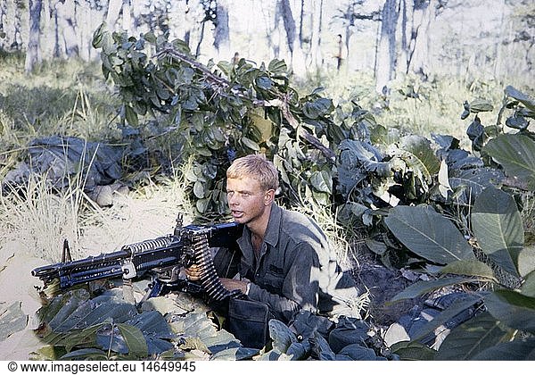 Vietnam War 1957 - 1975  American soldier of German origin Dierk Piffko on picket in the jungle  armed with machine gun M60  South Vietnam  1965  arm  weapon  weapons  arms  ammunition  ammunition belt  German  Germans  pristine forest  post  station  soldiers  soldier  military  Armed Forces  USA  United States of America  army  armies  South-East Asia  South East Asia  Southeast Asia  Far East  Viet Nam conflict  Viet Nam  Vietnam  war  wars  conflict  conflicts  1960s  60s  20th century  people  man  men  male  machine gun  machine guns  machine-gun  historic  historical
