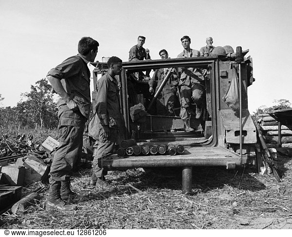 VIETNAM WAR  1969. American soldiers of the 2nd Battalion  8th Infantry  4th Infantry Division preparing a mortar carrier near Kontum  Vietnam. Photograph by James B. Egan  1969.