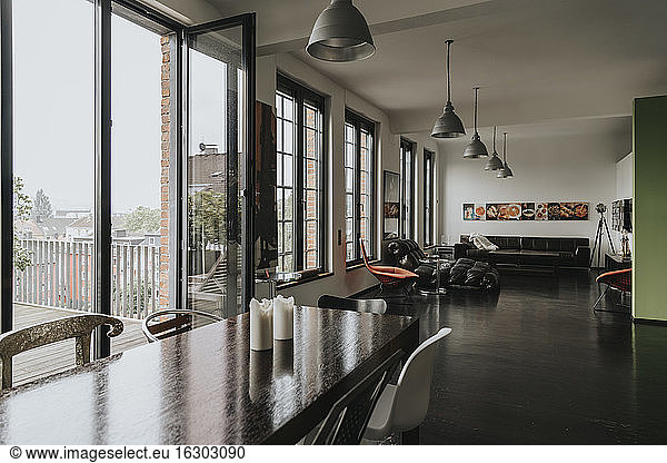 View from dining area to living area in a designer loft