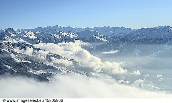 View from the Hohe Salve to the Windautal  mountain panorama in winter  cloudy valley  ski area SkiWelt Wilder Kaiser Brixental  Brixen im Thale  Tyrol  Austria  Europe