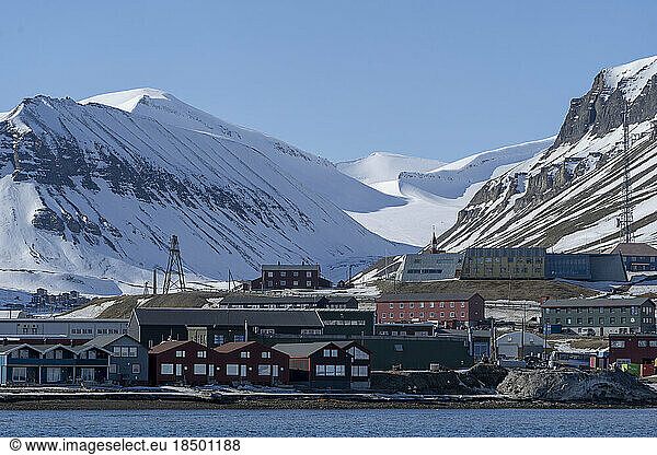 view from the sea of the houses of Longyearbyen in Spitsbergen