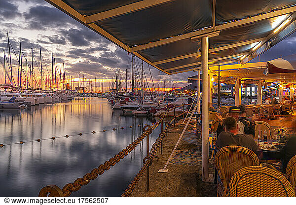View of boats and Marina Rubicon Shopping Center from restaurant at sunset  Playa Blanca  Lanzarote  Canary Islands  Spain  Atlantic  Europe