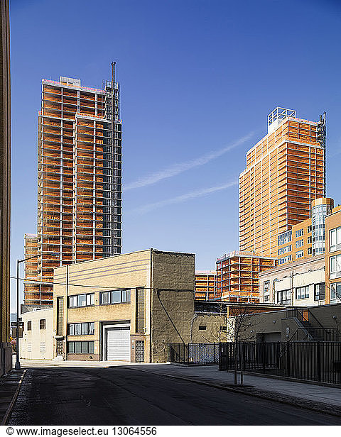 View of buildings against blue sky