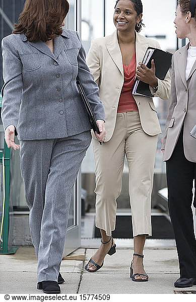 View of business women walking.