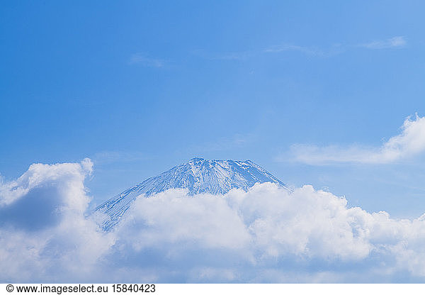 View of clouds over Mount Fuji and blue sky  Yamanashi Prefecture  Japan