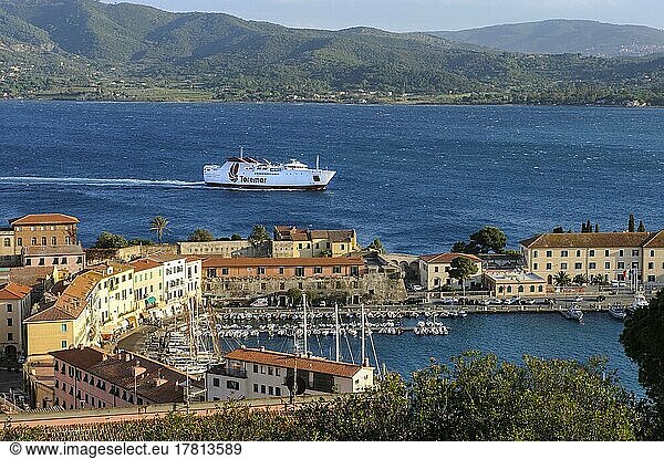 View of ferry from Italian mainland to Elba  in the foreground old harbour of Portoferraio  in the background bay of Portoferraio with coast of Elba  Portoferraio  Elba  Tuscany  Italy  Europe