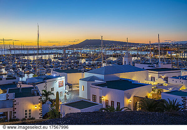 View of marina and shops at dusk in Marina Rubicon  Playa Blanca  Lanzarote  Canary Islands  Spain  Atlantic  Europe