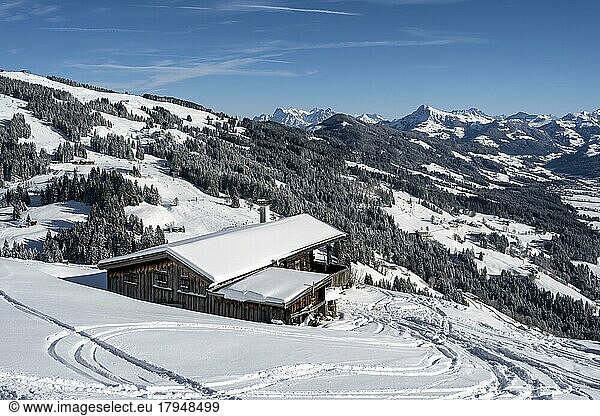 View of snow-covered mountains of Bixen im Thale  winter landscape  mountain hut in the snow  at the skiing area Bixen im Thale  Tyrol  Austria  Europe