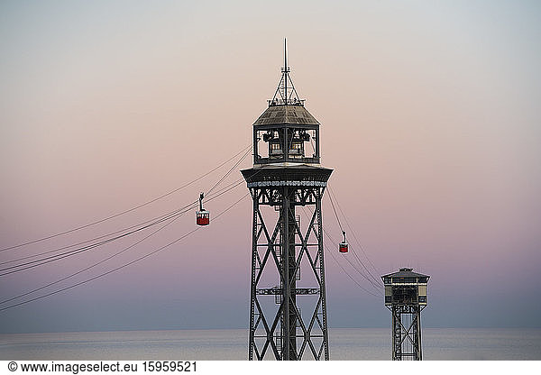View of the Barcelona Cable Car at sunset  Catalonia  Spain.