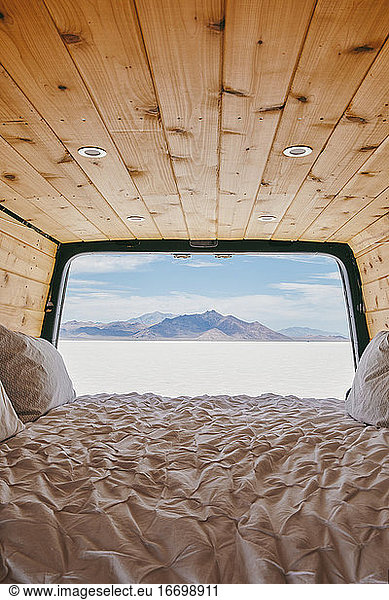 View of the Bonneville Salt Flats from bed of camper van.