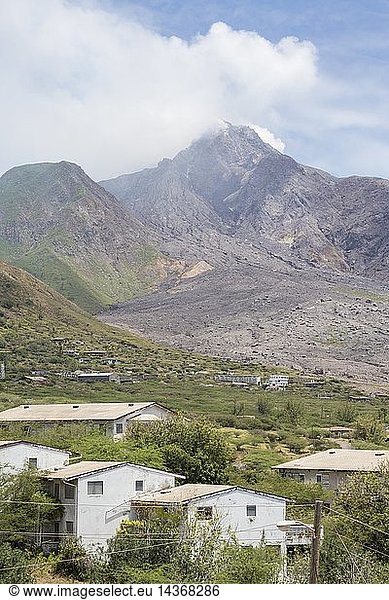 View of the haze around the peak of SoufriA?re Hills volcano  Montserrat  Caribbean  Leeward Islands  Lesser  Antilles
