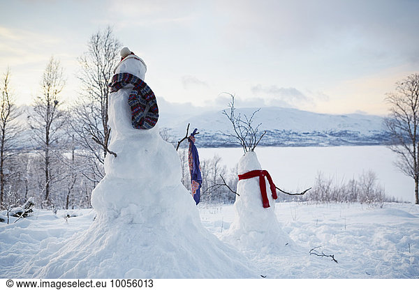 View of two snowmen wearing scarves  Hemavan  Sweden