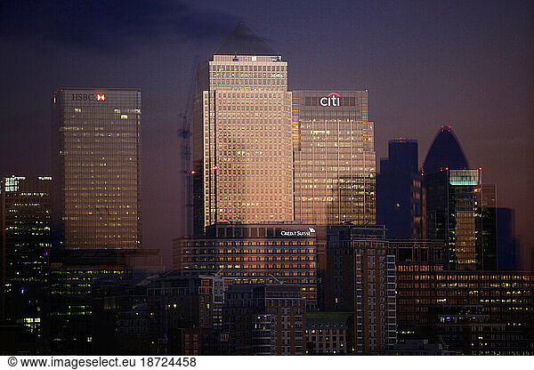 View on Banking and Financial Sector Buildings at Canary Wharf  London with the Gherkin and other buildings around Liverpool Street mirroring themselves in a glass door at a rooft