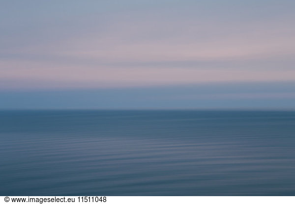 View out over the ocean at dusk  off the coast of Oregon.