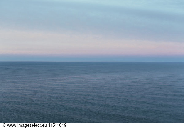 View out over the ocean at dusk  off the coast of Oregon.
