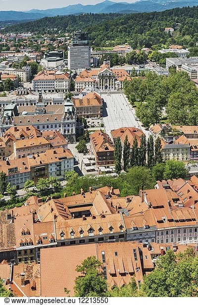 View over the old town of Ljubljana to the square Kongresni trg (Congress Square). At the Congress Square are the buildings of the Trinity Church the university and the Slovenian Philharmonic Ljubljana Slovenia Europe.