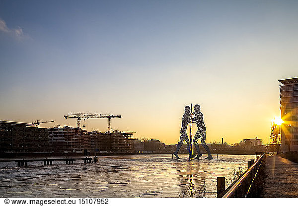 View to Molecule Man at sunset  Berlin  Germany