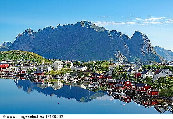 Village view  Reinefjord with mountains and red wooden houses  Reine  Moskenesöy  Lofoten  Nordland  Norway  Europe