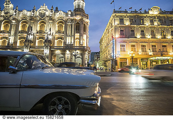 Vintage cars on the street at night  Havana  Cuba