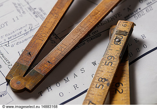 Vintage rulers on property map  close up