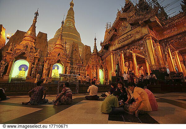 Visitors At Shwedagon Pagoda At Sunset; Yangon  Burma