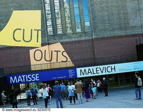 Visitors waiting for the Tate Modern gallery to open in the morning to see Henri Matisse Cut Outs exhibition  Bankside  London  England  Europe.