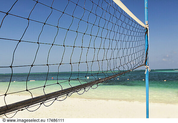 Volleyball net on a sandy beach