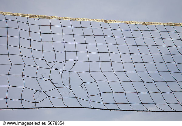 Volleyball net with a hole