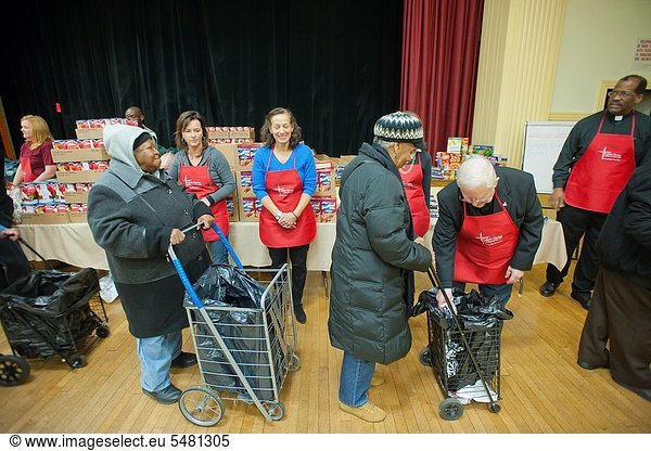 Volunteers distribute turkeys  stuffing and all the other ´fixin´s´ for a Thanksgiving dinner  to the neediest at the Catholic Charities´ Lt Joseph P Kennedy Center in Harlem in New York The families  who would otherwise not be able to afford the dinner . Volunteers distribute turkeys  stuffing and all the other ´fixin´s´ for a Thanksgiving dinner  to the neediest at the Catholic Charities´ Lt Joseph P Kennedy Center in Harlem in New York The families  who would otherwise not be able to afford the dinner  received the donations during a time where sources of relief for the poor and unemployed are constrained if not terminated The food is from the generosity of the former baseball player Rusty Staub and the Urso Fund for the Hungry and Homeless