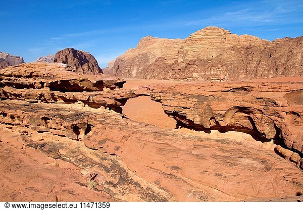 Wadi Rum desert  also known as The Valley of the Moon  is a valley cut into the sandstone and graniterock in southern Jordan.