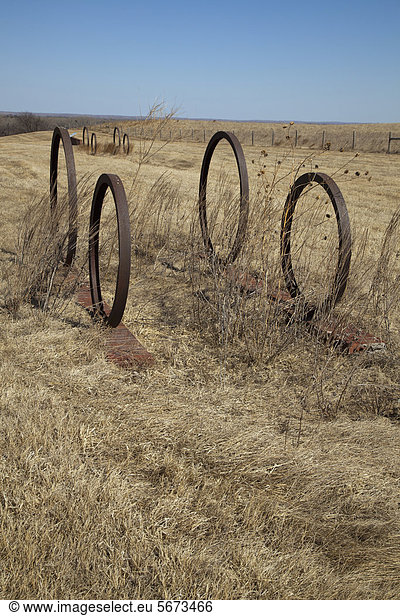 Wagon wheel sculptures and original wagon wheel trail ruts mark the ...