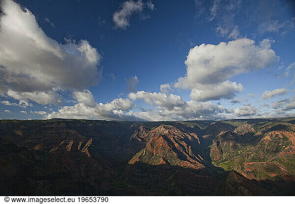 Waimea Canyon  often referred to as the Grand Canyon of the Pacific  offers impressive views from the rim.