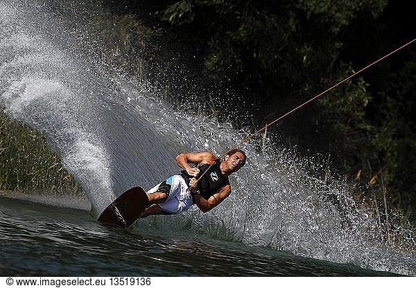 Wakeboard surfer on the Nordstrand lake in Erfurt  Thuringia  Germany  Europe