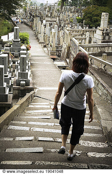 Walking down the steps in a cemetery.