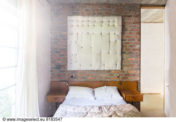 Wall hanging in modern bedroom