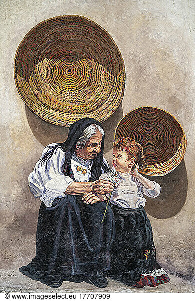 Wandgemälde einer Großmutter mit ihrem Enkelkind im Dorf Orgosolo  Sardinien  Italien; Orgosolo  Nuoro Sardinien  Italien