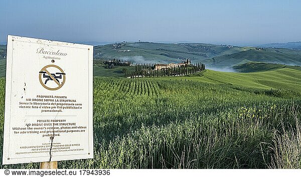 Warning sign for photos with drones  Agriturismo Baccoleno with cypresses (Cupressus)  Crete Senesi  Province of Siena  Tuscany  Italy  Europe