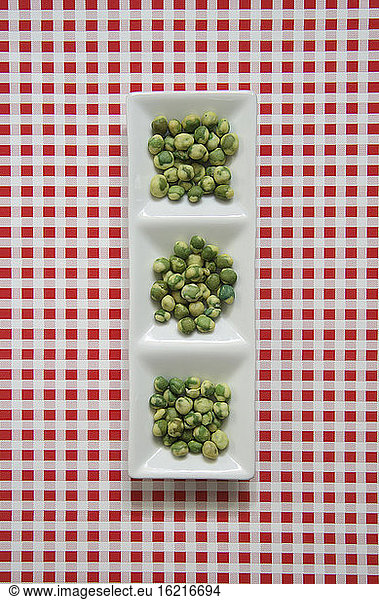 Wasabi peas in bowl  elevated view