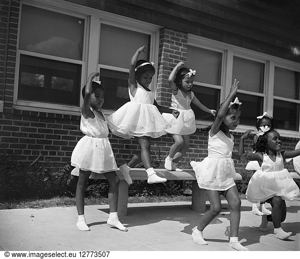 WASHINGTON D.C.  1942. A group of young dancers at the Frederick Douglass housing project in the Anacostia neighborhood of Washington D.C. Photograph by Gordon Parks  July 1942.