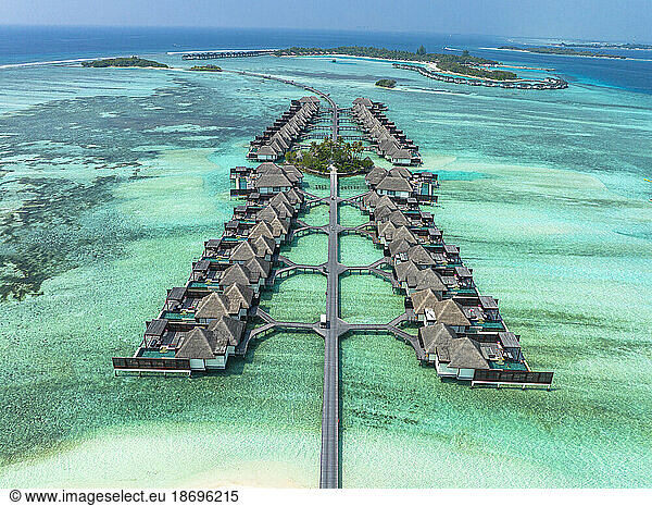 Water bungalows in rows at Kuda Huraa in Maldives