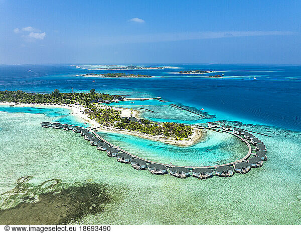 Water bungalows on Kanuhura island resort at Indian Ocean in Maldives