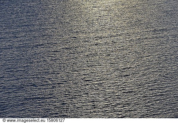 Water surface with light reflections  calm sea  Heligoland  North Sea  Schleswig-Holstein  Germany  Europe